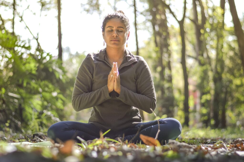 a woman performing yoga Meditation  